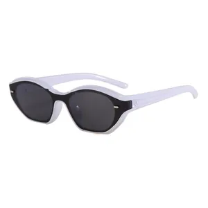 Retro cat-eye sunglasses with bold black and white contrast frames for a modern street look