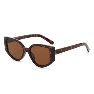 Lunettes de soleil œil de chat écaillées avec verres marron foncé pour femmes