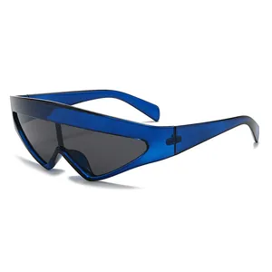 Futuristic oversized blue triangular sunglasses with dark grey lenses and sharp frame