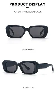 Detail view of shiny black square sunglasses featuring golden diamond studs and dark lenses