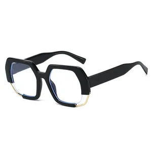 Fashionable black geometric oversized sunglasses with gold metal accents on frame