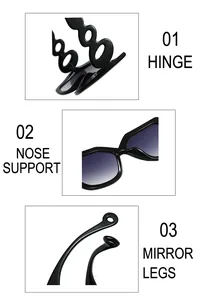 Detail view of black frame sunglasses with reinforced metal hinges and gradient lenses