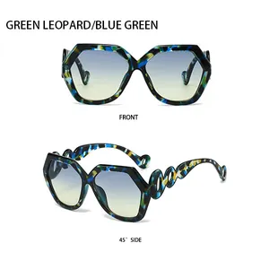 Detailed front and side views of green leopard print sunglasses with blue gradient lenses