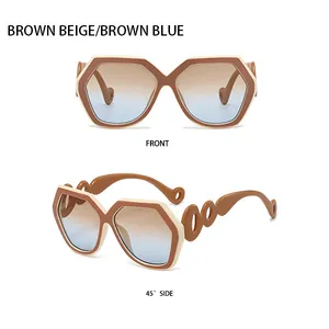 Detail of hexagon sunglasses showing brown beige frame and blue gradient lenses