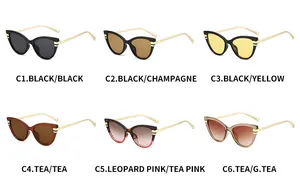 Six pairs of cat-eye sunglasses in various colors with metallic temples on white background