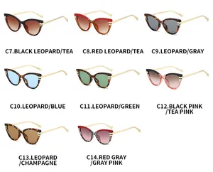 Cat eye sunglasses in eight colors with thin gold metal temples in a matrix layout
