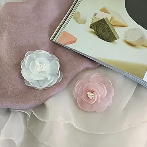 Elegant 3D fabric camellia hair clips in pink and white with delicate pearl center