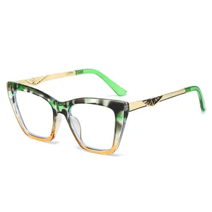 Cat eye bril in groen schildpad en oranje met goudkleurige metalen pootjes