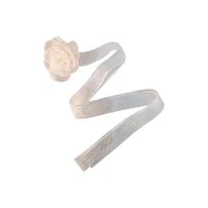 Elegant white lace choker with a 3D camellia flower and ribbon for a fairy-inspired look