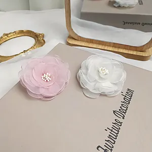 Elegant 3D mesh camellia hair clips in pink and white with delicate beaded centers