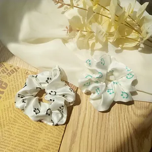 French style satin scrunchies set with black and green smiley face patterns for women