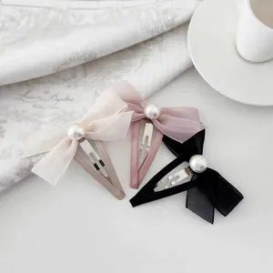 Lot de trois barrettes nœuds en résille avec perles en blanc, rose et noir chic