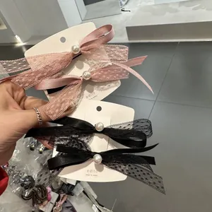 Fermagli per capelli coreani con fiocchi di pizzo e perle in rosa e nero