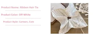 Detail of cream silk scrunchie with black polka dots and elegant ribbon streamers