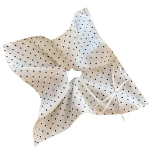 Elegant white polka dot bow scrunchie for women, vintage summer hair accessory in retro style