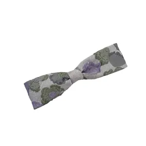 Floral embroidered fabric bow headband in light grey with purple and green patterns