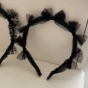 Elegant black lace and mesh bow headband for women in solid and polka dot styles