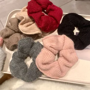 5-piece set of handmade knitted wool scrunchies in wine red, khaki, black, grey, and pink