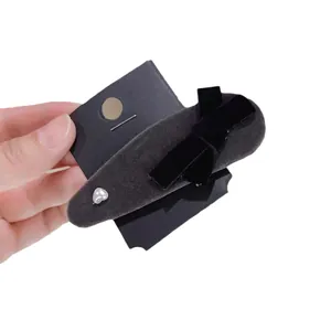 Elegant black velvet drop hair clip with a bow and heart pearl on display card