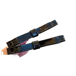 Set of two black patent leather double bow hair clips with minimalist glossy finish
