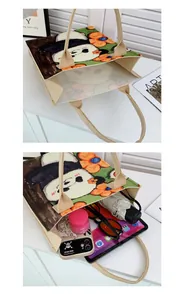 Detail view of panda canvas tote bag interior showing capacity for tablets and umbrellas