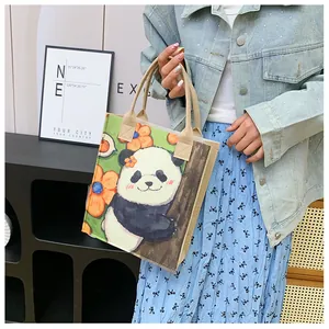Lifestyle view of panda floral felt tote bag with cute cartoon print for daily use