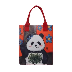 Panda floral tote bag with red handles featuring colorful cartoon panda illustration