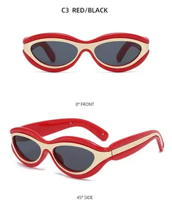 Close-up of red cat eye sunglasses with gold accents and dark grey lenses in two views
