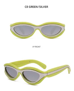 Front and side view of trendy wave-shaped green and silver cat-eye sunglasses