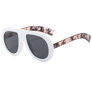 Oversized white frame sunglasses with marble texture temples in a 45-degree angle view