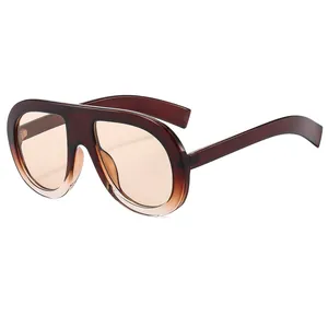 Oversized retro gradient sunglasses with brown frame and translucent brown lenses