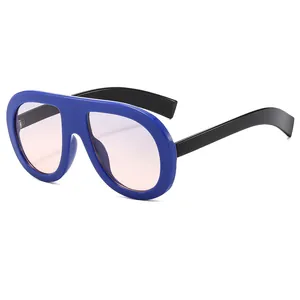 Oversized royal blue aviator sunglasses with gradient lenses and thick black temples