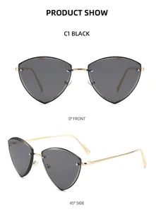 Detail view of gold rimless triangle sunglasses with grey lenses and metal temples