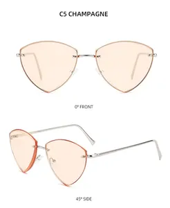 Detail of rimless champagne triangle sunglasses with silver metal temples and nose pads