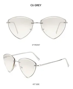 Detail view of rimless triangle sunglasses with grey gradient lenses and silver metal temples