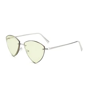 Modern rimless triangular sunglasses with silver metal frames and light green tinted lenses