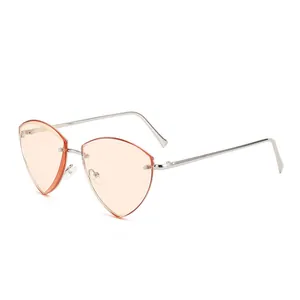 Sleek rimless triangular metal sunglasses with orange lenses and silver frame