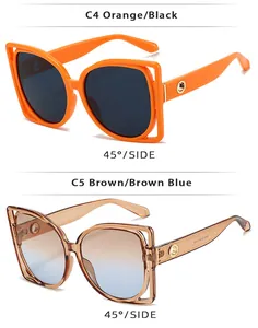 Close-up of square hollow frame sunglasses with dual-layer design and gold temple accents
