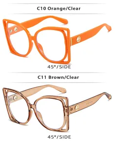 Detail view of stylish square hollow frames in orange and amber with metal hinges