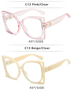Detail of pink and beige hollow frame sunglasses with side metal circular accents