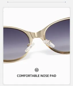 Detail view of adjustable silicone nose pads on futuristic gold metal Y2K sunglasses