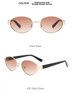 Detail view of oval sunglasses with gold metal frame and gradient brown lenses