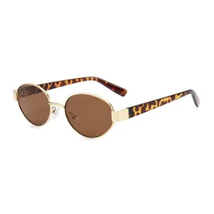 Retro oval sunglasses with golden metal frame, dark brown lenses and tortoiseshell temples