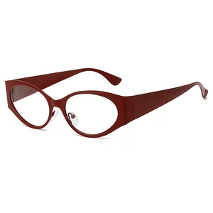 Futuristic Y2K deep red wrap sunglasses with bold oval cat-eye frames in punk style