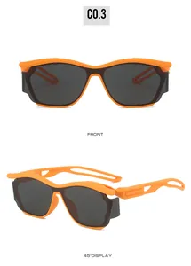 Front and 45-degree angle views of futuristic orange punk sunglasses with wrap lenses
