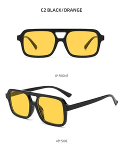 Detail view of double bridge sunglasses with black frames and orange tinted lenses