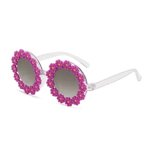 Fashionable round sunglasses with daisy flower frame and gray lenses for adults
