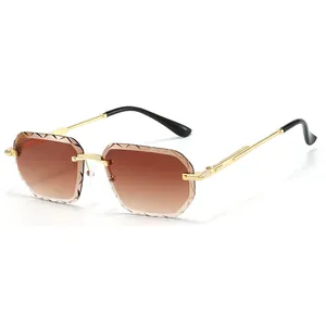 Retro polygon rimless sunglasses with brown gradient diamond-cut lenses and gold frame