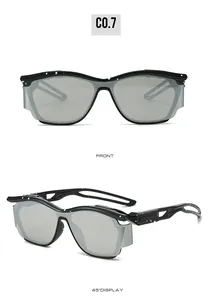 Front and side view of black Y2K punk sunglasses with white splatter design and curved lenses