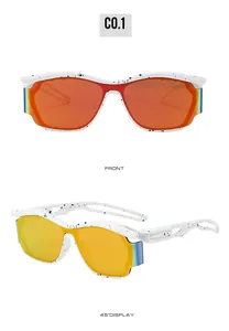 Close-up of Y2K futuristic sunglasses with white splatter frames and colored mirror lenses